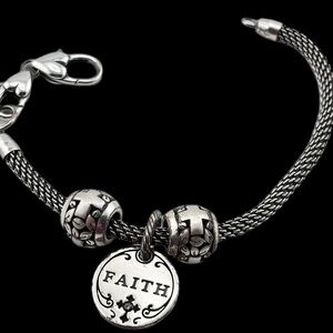 Brighton "FAITH" charm bracelet,Silver Plated, with a mesh or cable-style chain.